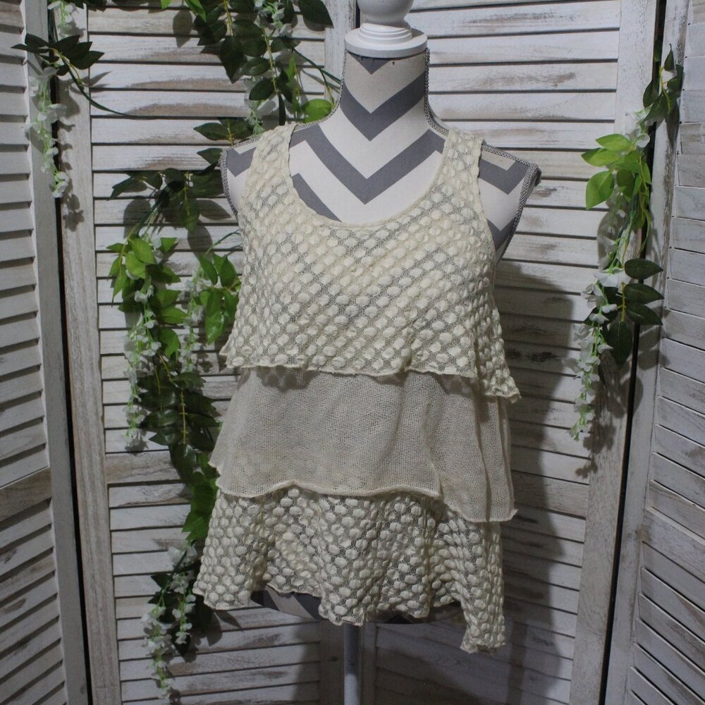 a ‘Reve layered top with back tie sleeveless